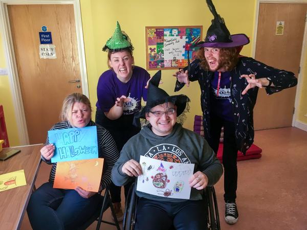 Photograph of participants dressed up for Halloween at one of our sessions